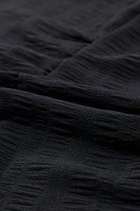 Black Smocked Textured Tiered Skater Dress